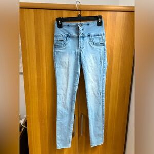 Blue mid rise skinny jeans